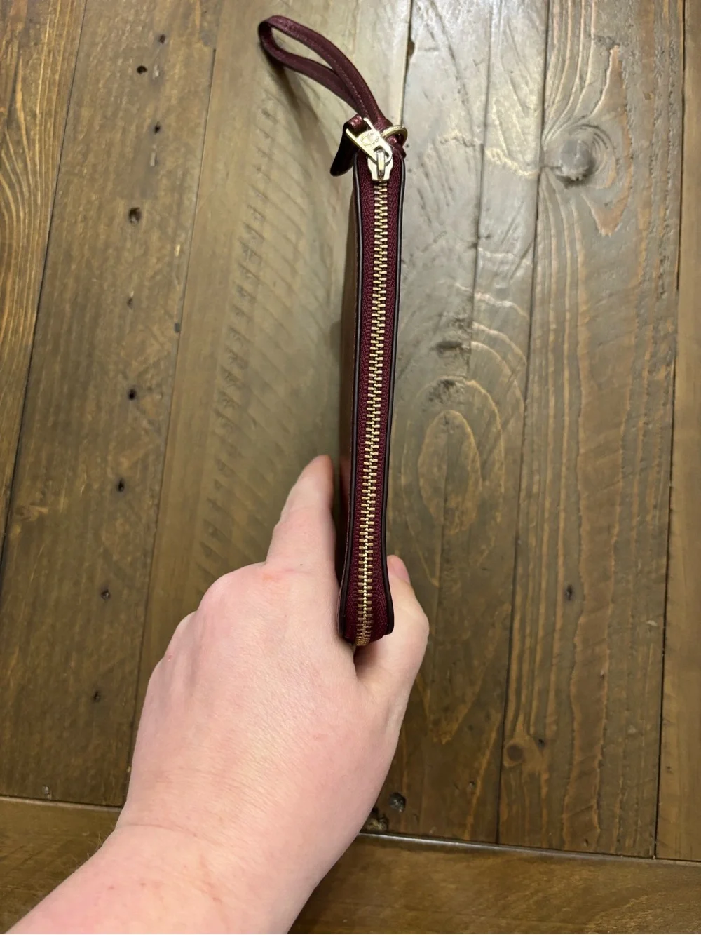 Coach Pebbled Leather Wristlet in Metallic Burgundy
